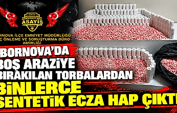 Bornova'da boş araziye bırakılan torbalardan binlerce sentetik ecza hap çıktı